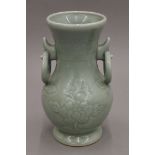 A Chinese Celadon porcelain vase. 32 cm high.
