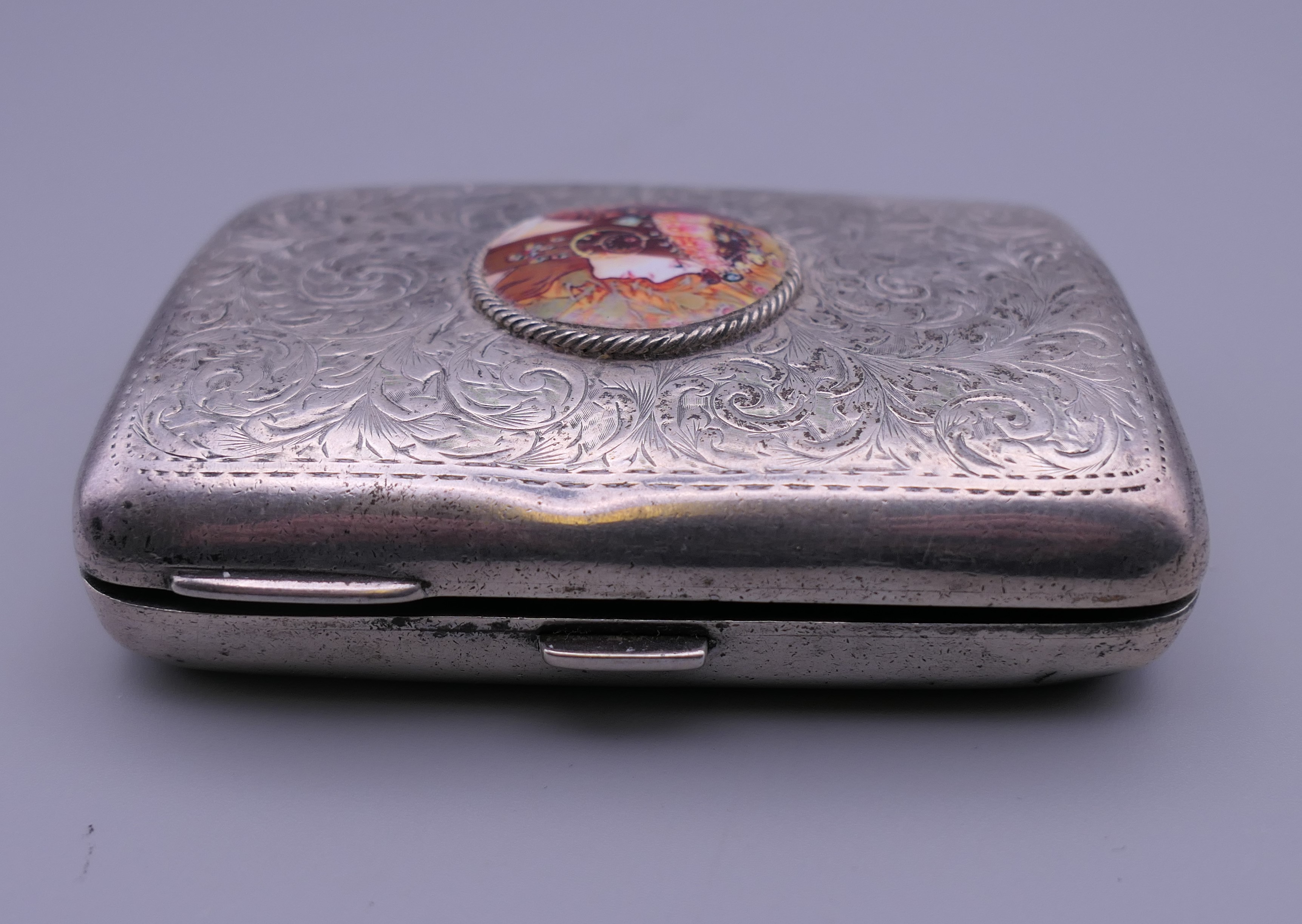 A silver cigarette case depicting a girl. 6 cm wide. - Image 7 of 7