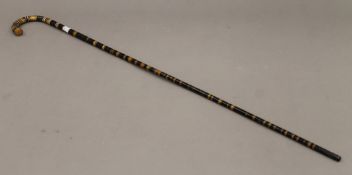 A sectional horn walking stick. 90.5 cm long.