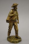 A gilt bronze, circa 1900, 'The Wayfarer' by Carolla, signed on the integral base. 21 cm high.