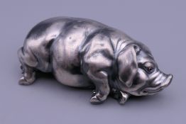 A silver model of a pig bearing Russian marks. 7 cm long.