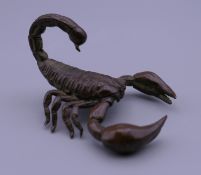 A bronze model of a scorpion. 5 cm long.