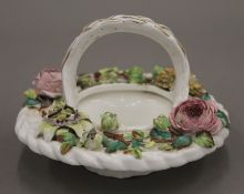 A 19th century Continental flower encrusted porcelain bowl. 17 cm diameter.