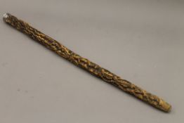 A Victorian silver plated mounted cork walking stick. 84 cm high.