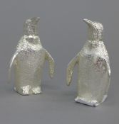 A pair of silver plated penguin form cruets. 7.5 cm high.