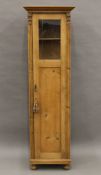 A 19th century pine glazed cupboard. 53.5 wide x 181 cm high.