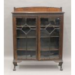 An early 20th century mahogany display cabinet. 106.5 cm wide.