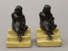 Two 18th/19th century bronze models of children, each mounted on a lead base. 10 cm high.