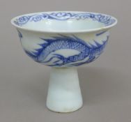 A Chinese blue and white porcelain stem cup. 9 cm high.