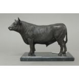 A bronze model of a bull. 26.5 cm long.