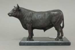 A bronze model of a bull. 26.5 cm long.