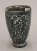 A Grand Tour type antiquity style pottery cup. 9 cm high.