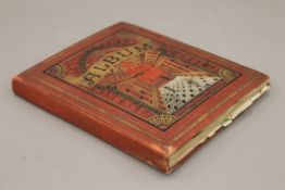 A late 19th century scrap book and dried flowers album.