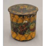 A painted papier mache tea caddy. 11.5 cm high.