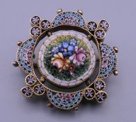 A micro mosaic brooch. 2.5 cm diameter.