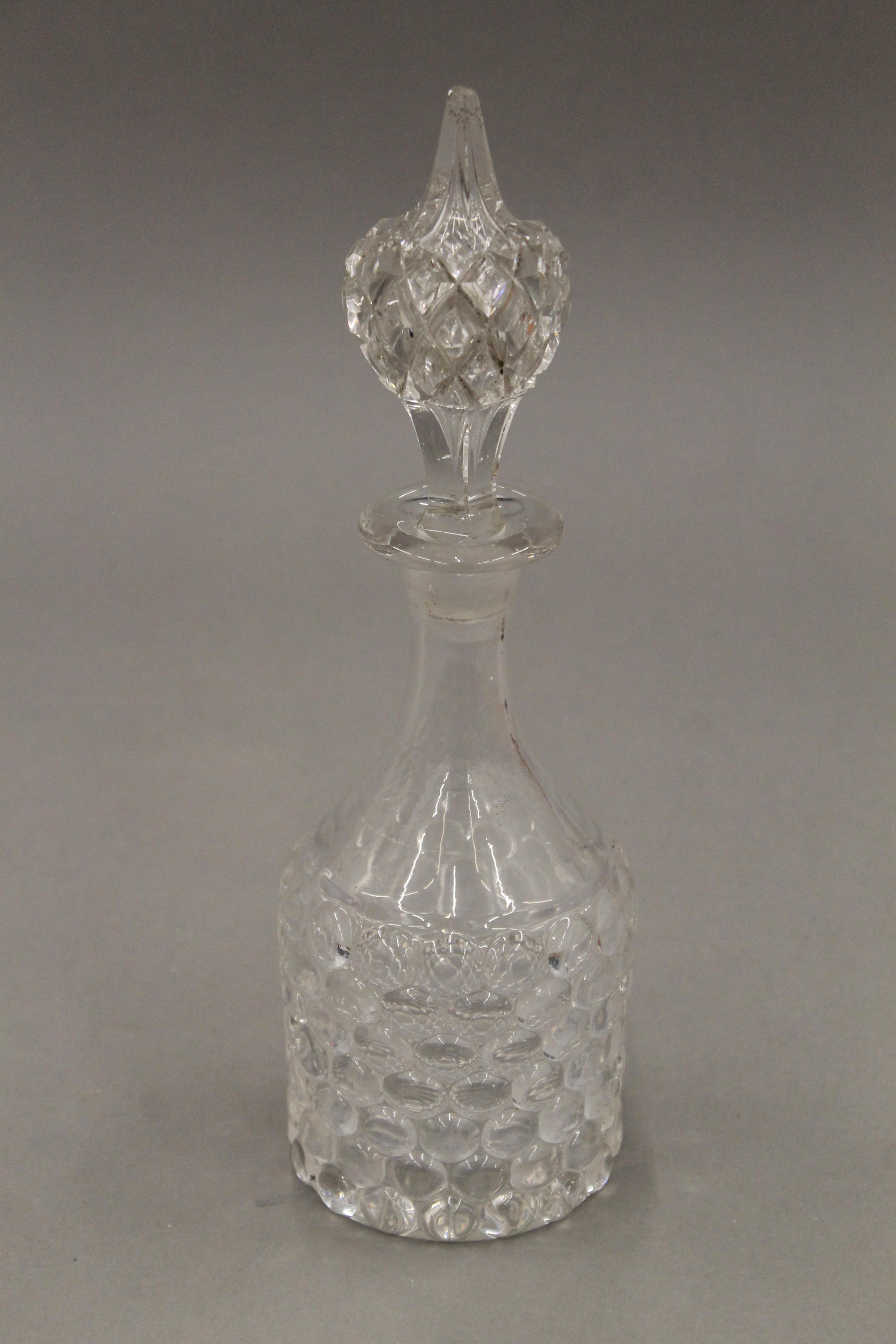A quantity of various cut glass decanters. - Image 9 of 15