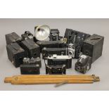 A collection of vintage cameras.