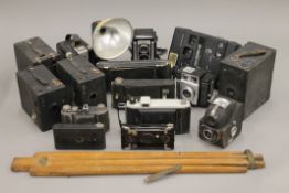 A collection of vintage cameras.