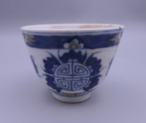 A Chinese blue and white porcelain tea bowl. 5.5 cm high.