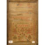 A 19th century sampler worked by Lilly Shand aged 8 years, framed and glazed. 30 x 43 cm overall.