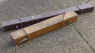 Two vintage fishing rod boxes (the largest 192 cm long) and a rod.