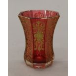 A 19th century Bohemian octagonal cranberry glass with gilt decoration. 11 cm high.