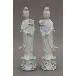 A pair of Chinese porcelain Republic Period figures of Guanyin. 30 cm high.