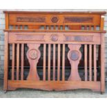 A Victorian walnut double bed (140 cm wide), together with a metal double.