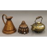 A copper jelly mould, a copper jug and a brass kettle. The latter 23.5 cm high.