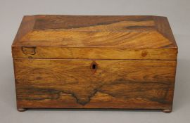 A 19th century rosewood three section tea caddy. 33 cm wide.