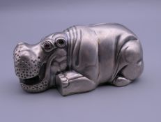 A silver model of a hippo bearing Russian marks. 7.5 cm long.