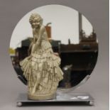 A Leonardi 1930's Art Deco plaster lady set on a chrome base with a circular mirror behind her,