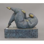 An abstract bronze sculpture of a large lady. 25 cm long.