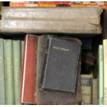 A quantity of books, including Holy Bibles.