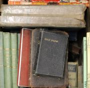 A quantity of books, including Holy Bibles.