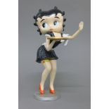 A cast iron model of Betty Boop. 30 cm high.