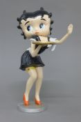 A cast iron model of Betty Boop. 30 cm high.