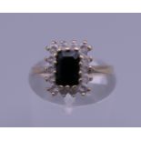 A 9 ct gold sapphire ring. Ring size K. 1.8 grammes total weight.