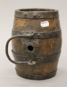 A 19th century harvest barrel. 21.5 cm long.