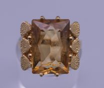 A 9 ct gold citrine ring. Ring size L. 4.2 grammes total weight.