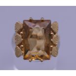 A 9 ct gold citrine ring. Ring size L. 4.2 grammes total weight.