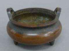 A small bronze censer. 10 cm diameter.