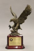 An eagle on stand from the London FBI office to the Yeoman Warders. 29.5 cm high.