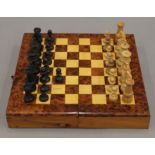 A modern chess box and chess set (not complete). 23.5 cm wide.