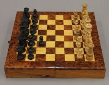 A modern chess box and chess set (not complete). 23.5 cm wide.