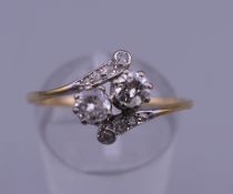 An Edwardian 18 ct gold diamond ring. Ring size P/Q. 2.3 grammes total weight.