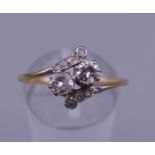 An Edwardian 18 ct gold diamond ring. Ring size P/Q. 2.3 grammes total weight.