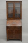 An early 20th century oak bureau bookcase. 72.5 cm wide.