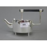 A Christopher Dresser style teapot. 13 cm high.