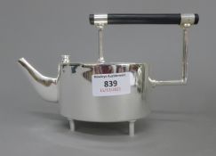 A Christopher Dresser style teapot. 13 cm high.